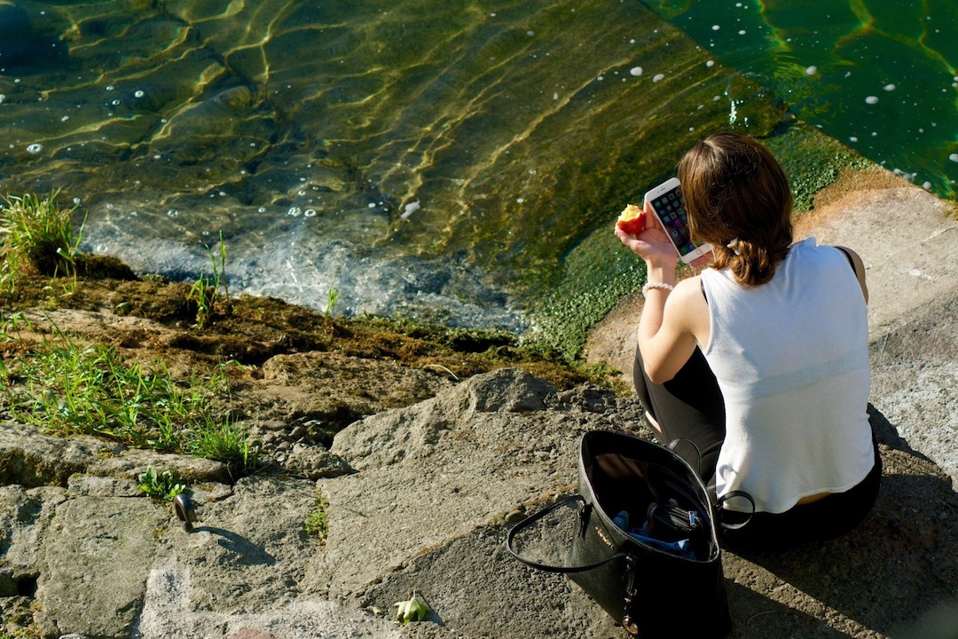 Girl-on-Ground-With-Smartphone