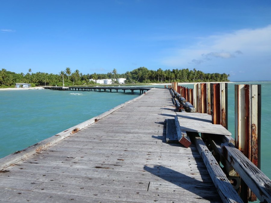 Oil storage tanks adjoin the disused old jetty near the north end of West Island, Cocos (Keeling) Islands.