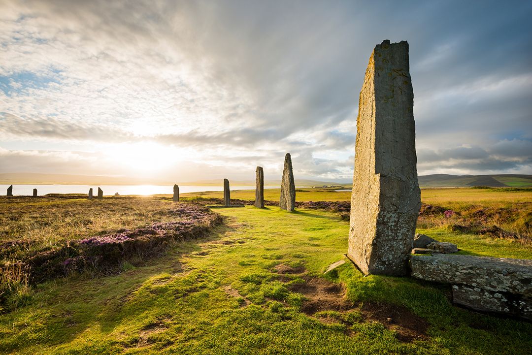 The sun rises on the enigmatic 'Ring Of Brodgar' in Orkney, Scotland. Photo by Justin Foulkes.