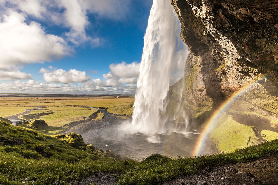 Water cascading into pool creating rainbow at Seljalandsfoss, Iceland. Photo by Gary Latham.