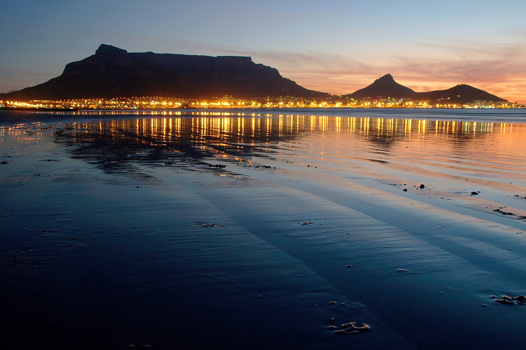 Table Mountain at sunset behind Cape Town