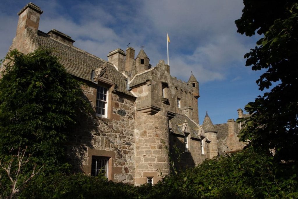 Looking up at Cawdor Castle on a cloudy day