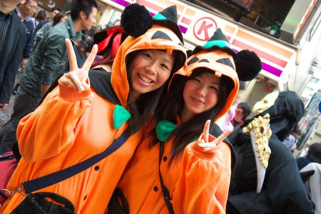 Two people dressed up for the Halloween festival in Kawasaki