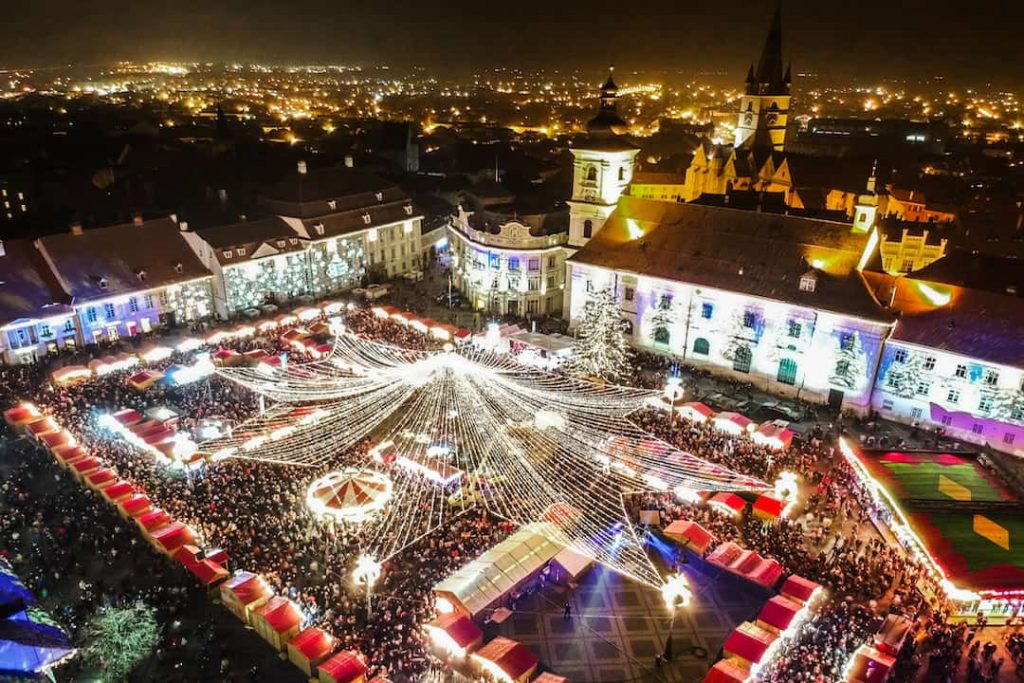 A nighttime shot of the lights at the Sibiu Christmas Market