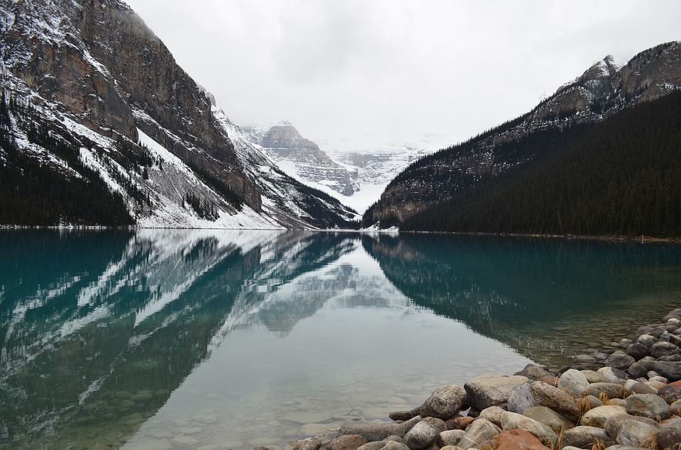 Lake Louise in Banff, shimmering turquoise waters and snowy mountain caps