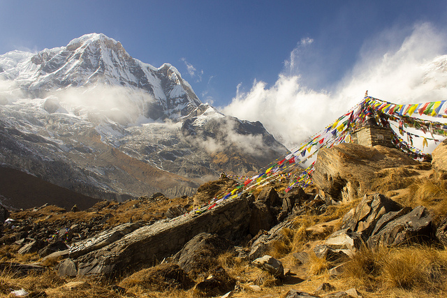 colourful flags at Annapurna Base Camp, Nepal with the mountain massif in the background