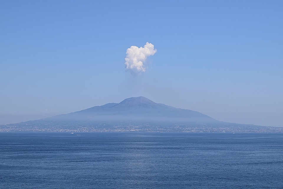 A jet of steam rises out of Mount Vesuvius as seen from Sorrento 