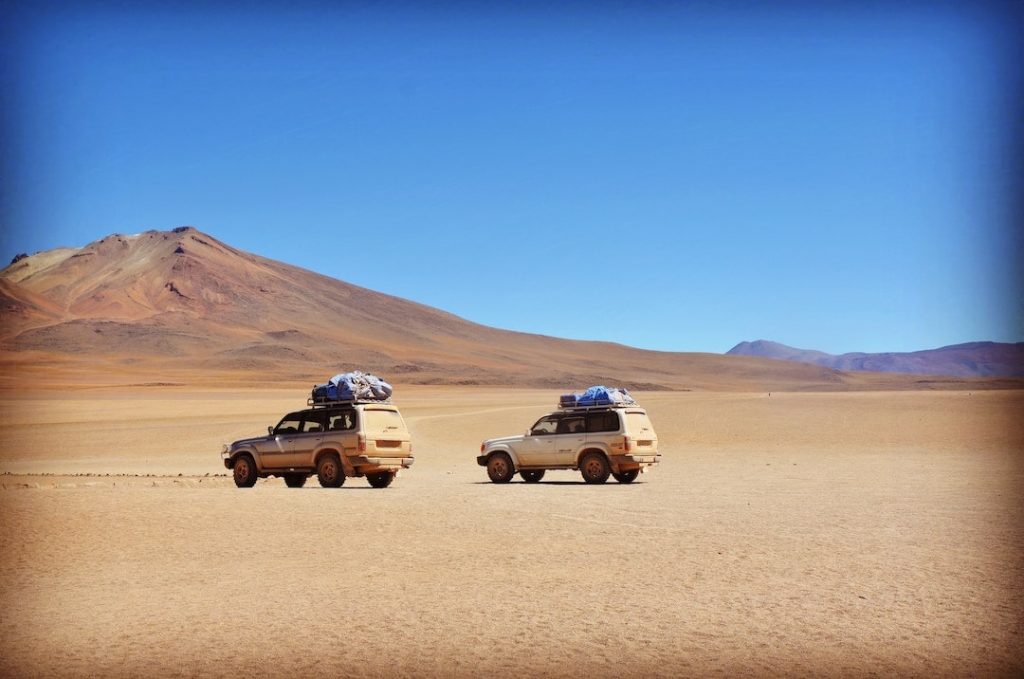 Two cars in Bolivia in the desert