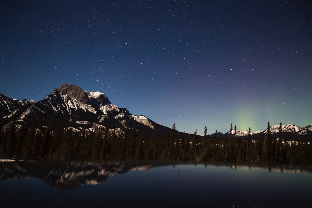 The northern lights over a mountain in jasper National Park, Alberta