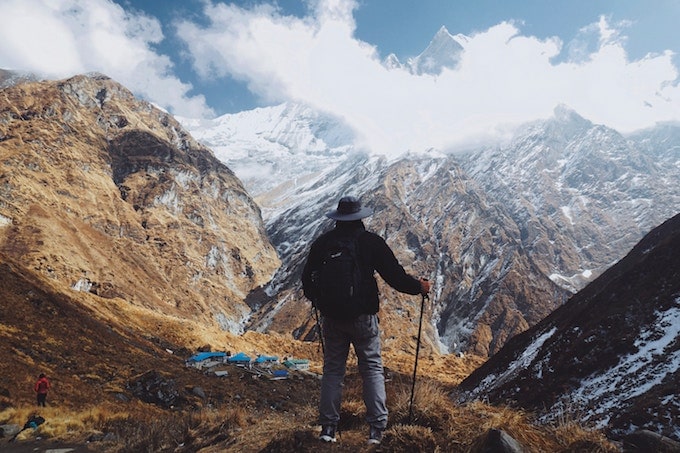 A man with a hiking pole at Annapurna Sanctuary, Ghandruk, Nepal