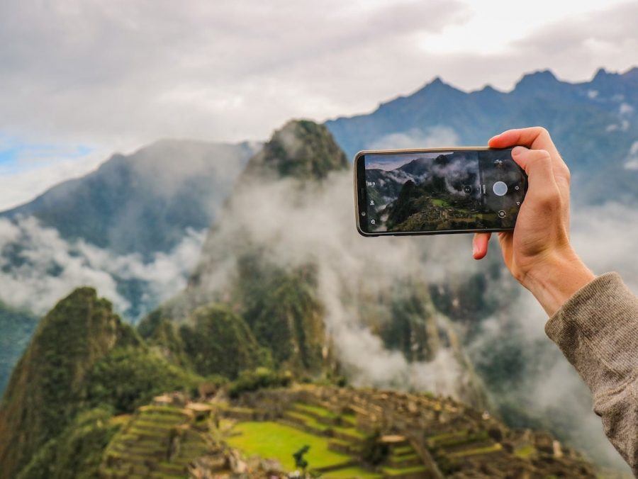 Person taking photo with smartphone 