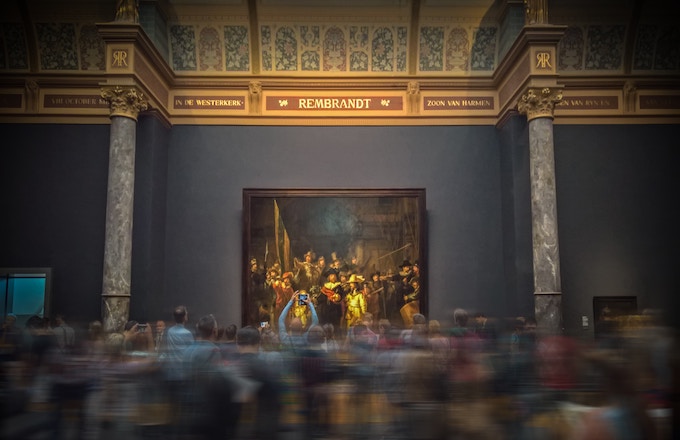 crowds in front of The Night Watch by Rembrandt in the Rijksmuseum in Amsterdam