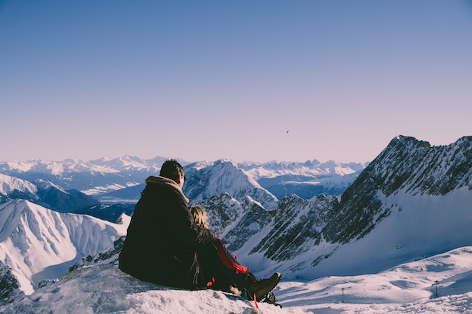 A couple on the summit of Zugspitze, Germany