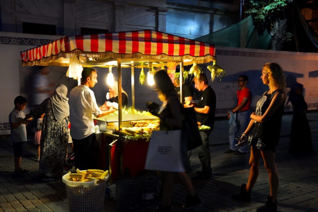 Vendor selling grilled corn on the street in Istanbul, Turkey