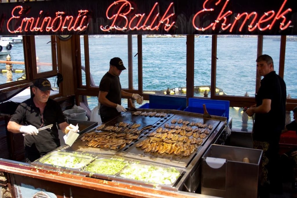 Vendors selling balik emenek in Eminönü, Istanbul