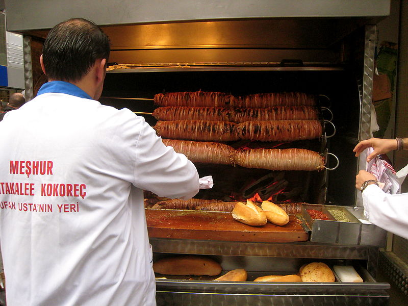 Vendor cooking kokorec in Istanbul, Turkey