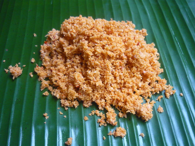 golden shredded coconut on a banana leaf