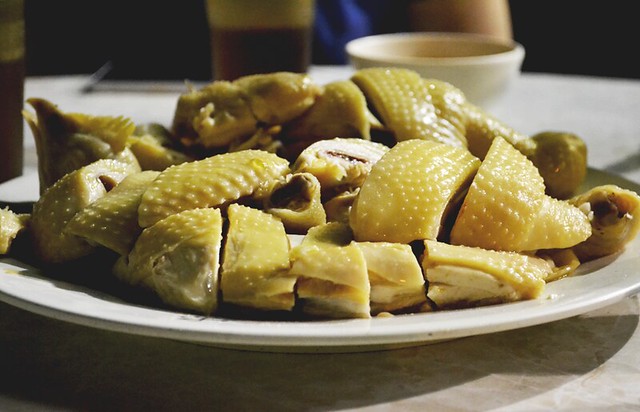 pieces of poached chicken on a plate