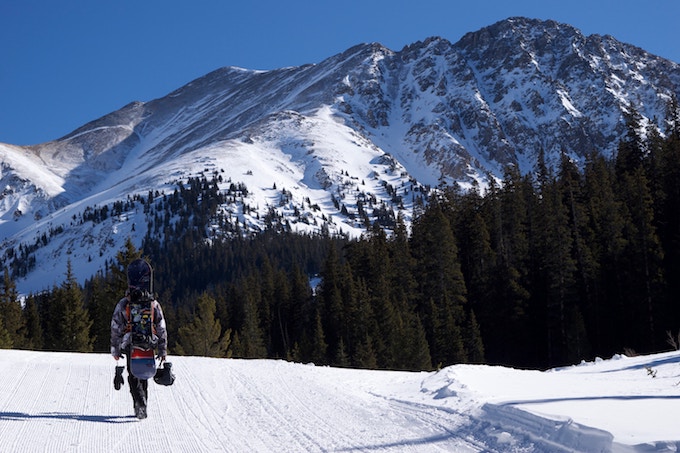 A man hiking in the Arapahoe Basin Ski Area, Keystone, USA