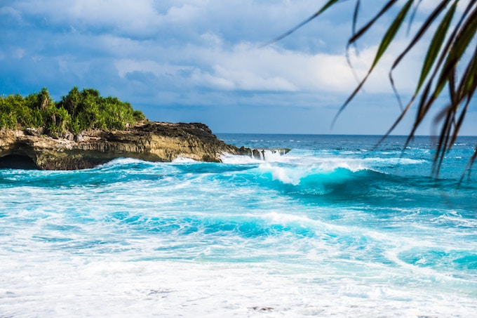 Blue waves at a beach in Indonesia