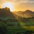 The sun setting over a valley in Vinales, Cuba