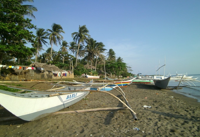 Boats on the shore in Donsol, the Philippines