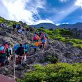 Hikers climbing Mt Fuji in Japan