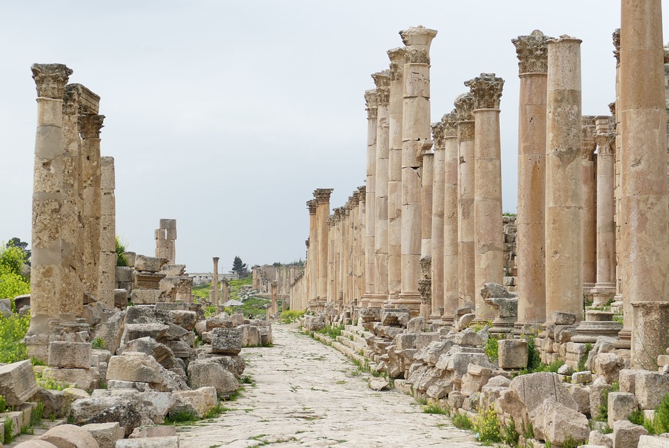 ancient sand stone coloured pillars that are ruins