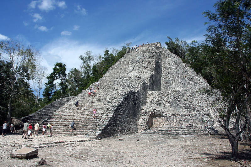 a grey pyramid shaped rock