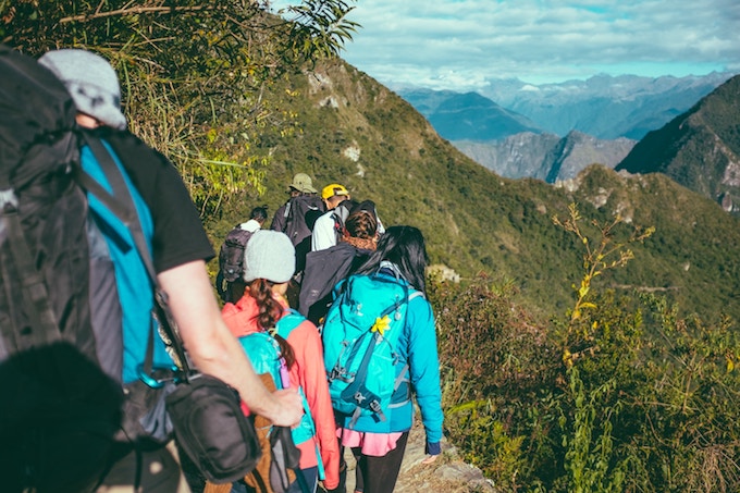 A group of people hiking in Aguas Calientes, Peru