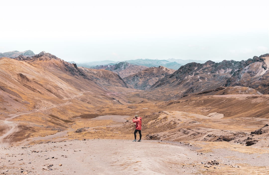 A person walking alone in Vinicunca, Cusco, Peru