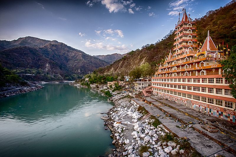 Rishikesh temple with natural heritage sites of water body.