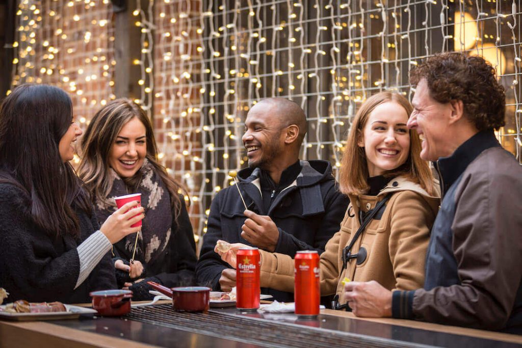 People eating and drinking at the Toronto Christmas Market