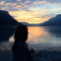 Woman standing near lake in Brienz, Switzerland