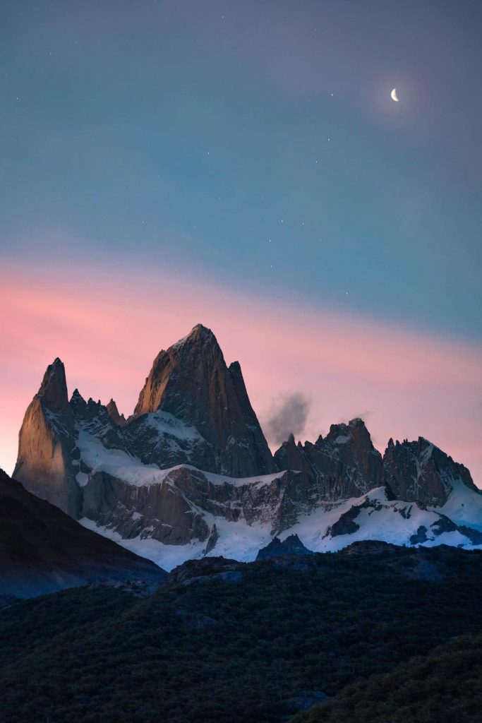 Mountain peak with moon in the sky at El Chaltén, Argentina