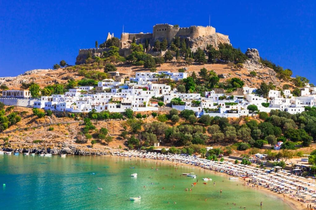 The Greek island of Rhodes is famous for its historic landmarks and beautiful beaches.